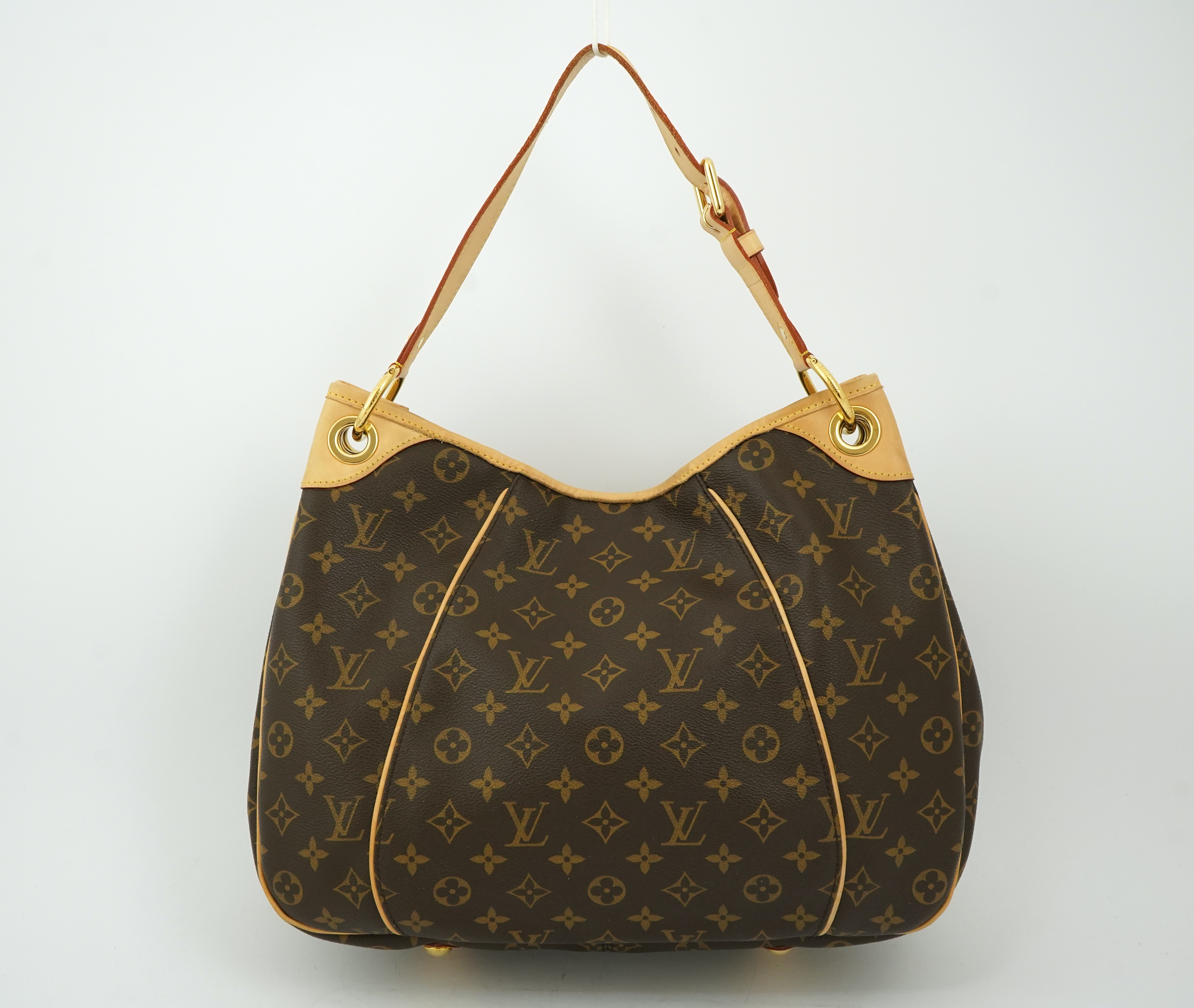 A Louis Vuitton brown monogram canvas with natural cowhide trim and gold-toned hardware